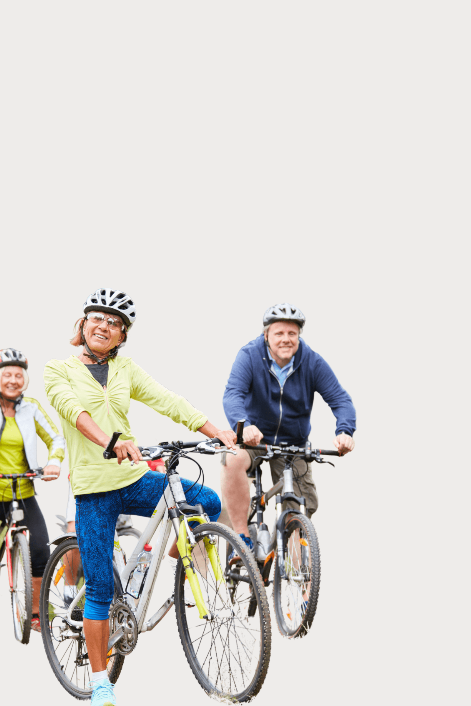 A group of people riding bikes